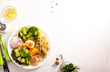 Salad with Prawns and Eggs with vegetables on plate