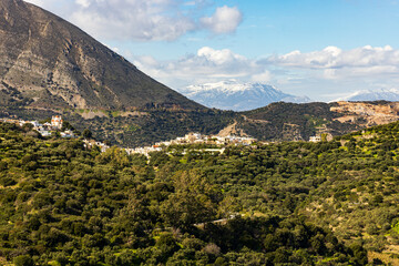 Fototapeta na wymiar Scenic view over a mountain village and landscape in crete, Greece