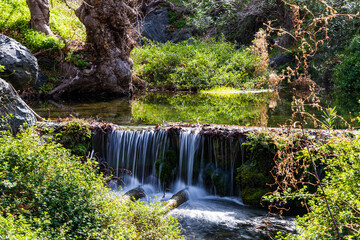 Beautiful shot of a river with waterfall at Richtis Gorge in Crete, Greece