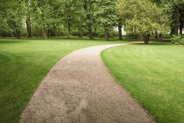 An artificial path on a lawn of fresh grass