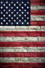 Flag of United States of America on a brick wall
