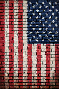 Flag of United States of America on a brick wall