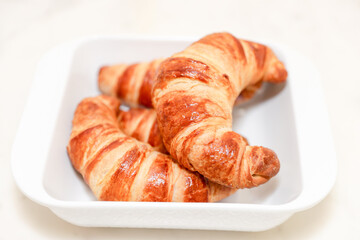 Croissant bread in white plate made at home - Image