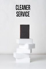 Cleaning sponges on white. Cleaning service concept. Cleaning supplies. House cleaning concept