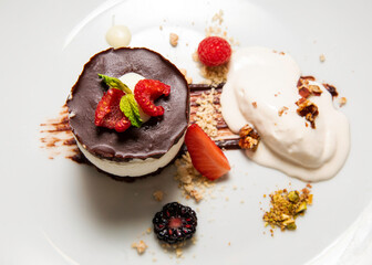 Delicious chocolate ice cream dessert with strawberries