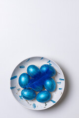 Happy easter time. Bright Easter holiday concept with spring flowers and easter eggs. Colorful Easter eggs background