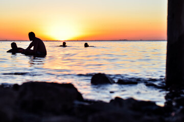 silhouette of a couple on the beach