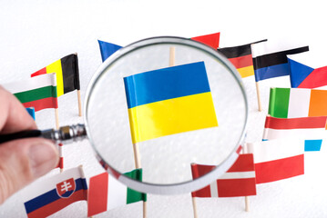 Flag of Ukraine on the background of the flags of the European Union.