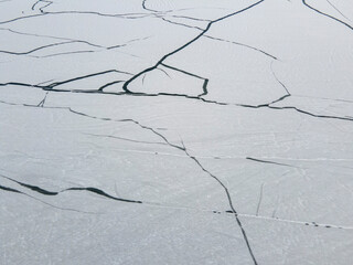 Aerial winter view of Batak Reservoir covered with ice, Bulgaria