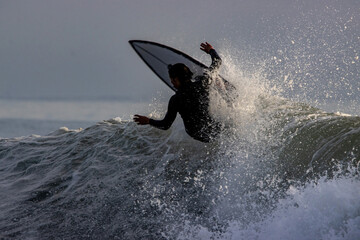Surfing winter waves at Rincon point in California