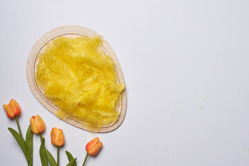 Happy easter time. Bright Easter holiday concept with spring flowers and easter eggs. Colorful Easter eggs background