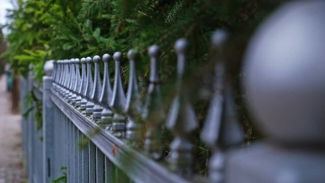 Picket Style Quad Spear and Ball Pointed Metal Fence Around Property Rack Focus