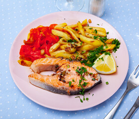 Traditional spanish food, salmon con pimiento y patata, roasted salmon with potato and pepper