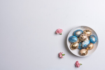 Happy easter time. Bright Easter holiday concept with spring flowers and easter eggs. Colorful Easter eggs background