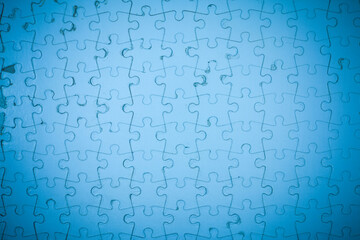 Blue Jigsaw puzzle background.