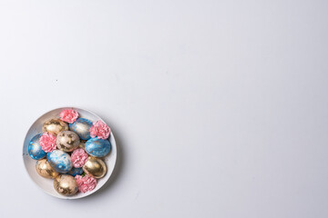 Happy easter time. Bright Easter holiday concept with spring flowers and easter eggs. Colorful Easter eggs background