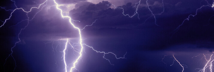 Thunder, lightnings and rain during summer storm.