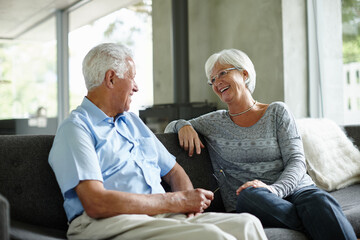 When someone elses happiness is your happiness, that is love. Shot of a senior couple sitting in their living room.