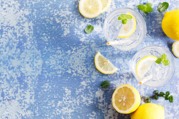Iced lemonade soda drink with fresh mint leaves.