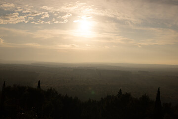 Obraz premium Wide angle view over the beautiful Italian landscape at sunset from Castel del monte - travel photography