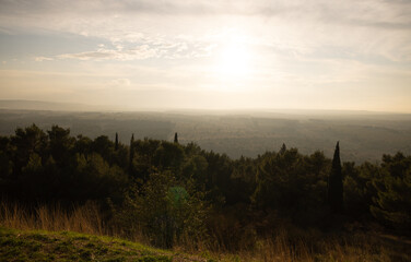 Wide angle view over the beautiful Italian landscape at sunset from Castel del monte - travel photography