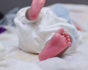 Closeup shot of an african newborn baby or infant's cute legs