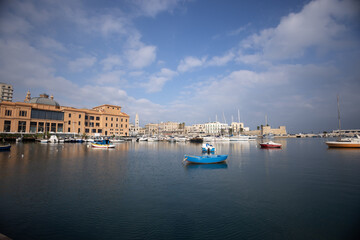 Fototapeta premium Fishing boats in the harbor of Bari at the Italian coast - travel photography