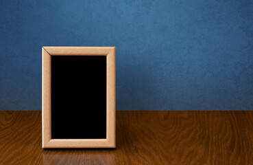 frame on table, blue wall