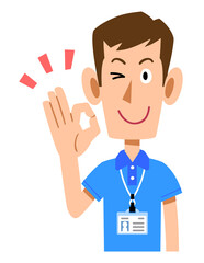 半袖のポロシャツ姿でネームタグを身に着けた男性スタッフのOKサイン
