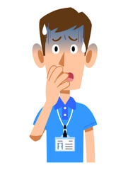 半袖のポロシャツ姿でネームタグを身に着けた男性スタッフの青ざめた表情
