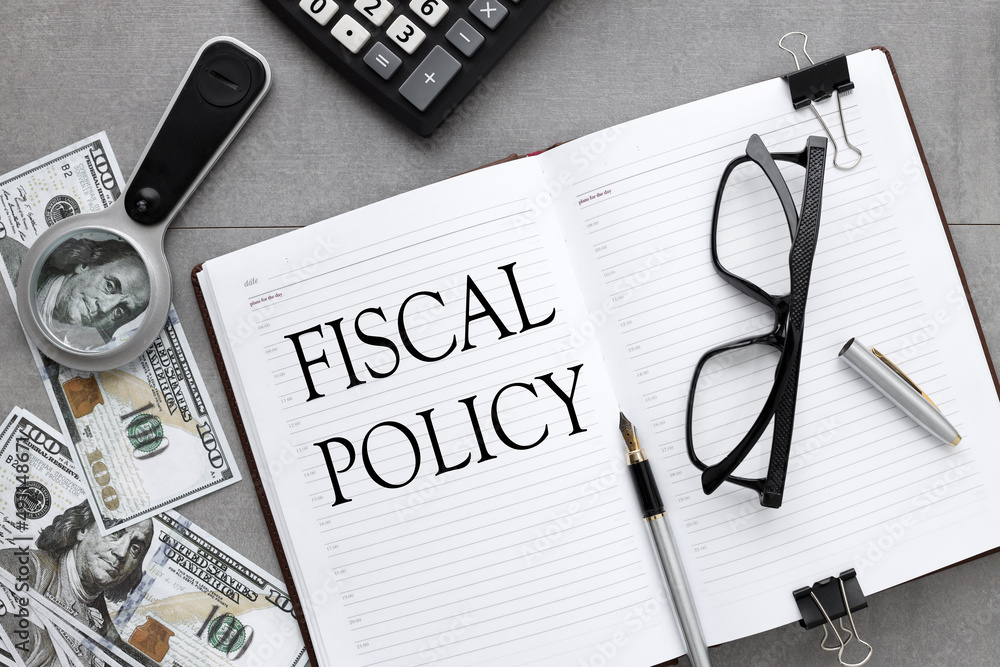 Poster open diary on a gray background. text in an open notebook. fiscal policy