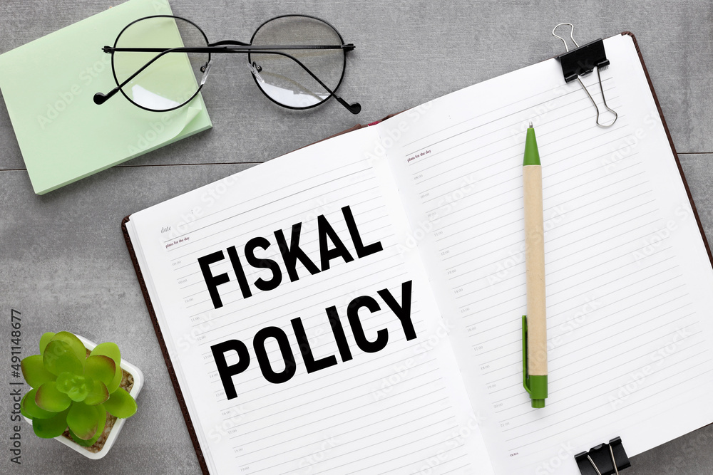 Poster open diary on a gray background. text in an open notebook. fiscal policy