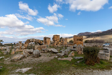 Fototapeta na wymiar colonnade on the main street of ancient ruined city Hierapolis in Turkey