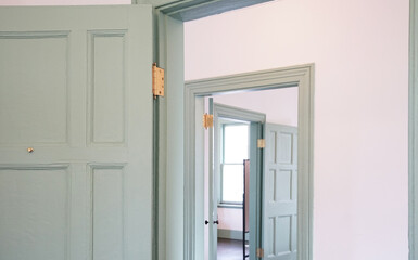 Fototapeta premium Hinges hardware of the opening and closing doors of room entrances