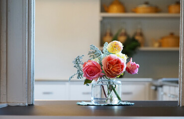 Floral decoration on the kitchen shelf in the room