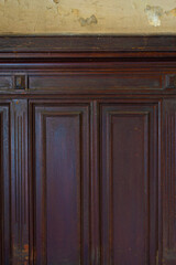 Close up, dark wood wall panel, english panel, wainscot, boiserie panels. Detailed texture