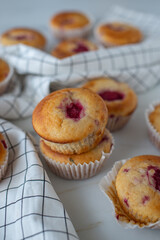 sweet vanilla raspberry muffins on a table