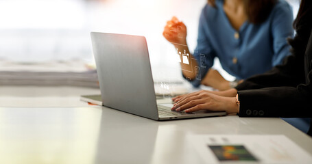 Team of Business working on laptop computer analysis economy finance and sale data growth on interface icons, Banking, Finance, Business Strategy on global business Digital network connection technolo