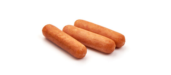Boiled chicken sausages, isolated on white background.