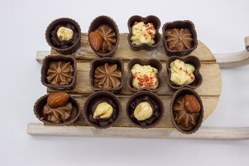 Few chocolates candy stand on sledge