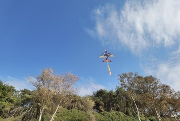 kite on the sky among clouds beside sea in green monday in greece