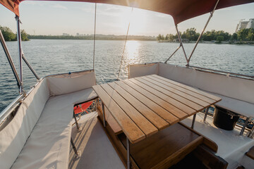 Luxury yacht in the port, stern table and seats
