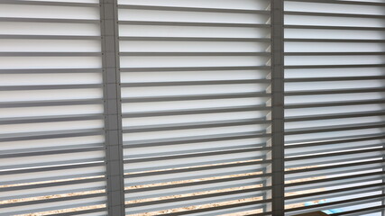 Aluminum slats. Decorating louvers or metal panels on the walls for ventilation and allowing light to pass through. Selective focus