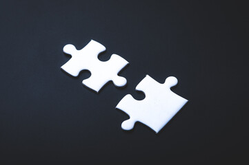 two pieces of jigsaw use for business partner connection concept, white puzzle solution teamwork in success vision concept