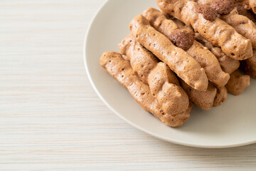 chocolate meringue stick on plate