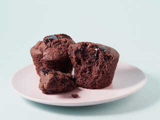 Chocolate cupcakes with cherry jam isolated on a white background. Chocolate muffin. High quality photo