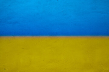 Blue and yellow colored abstract wall texture background, colors of Ukraine Flag
