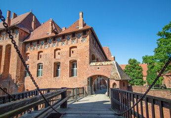 Obraz premium Malbork, Poland - largest castle in the world by land area, and a Unesco World Heritage Site, the Malbork Castle is a wonderful exemple of Teutonic fortress