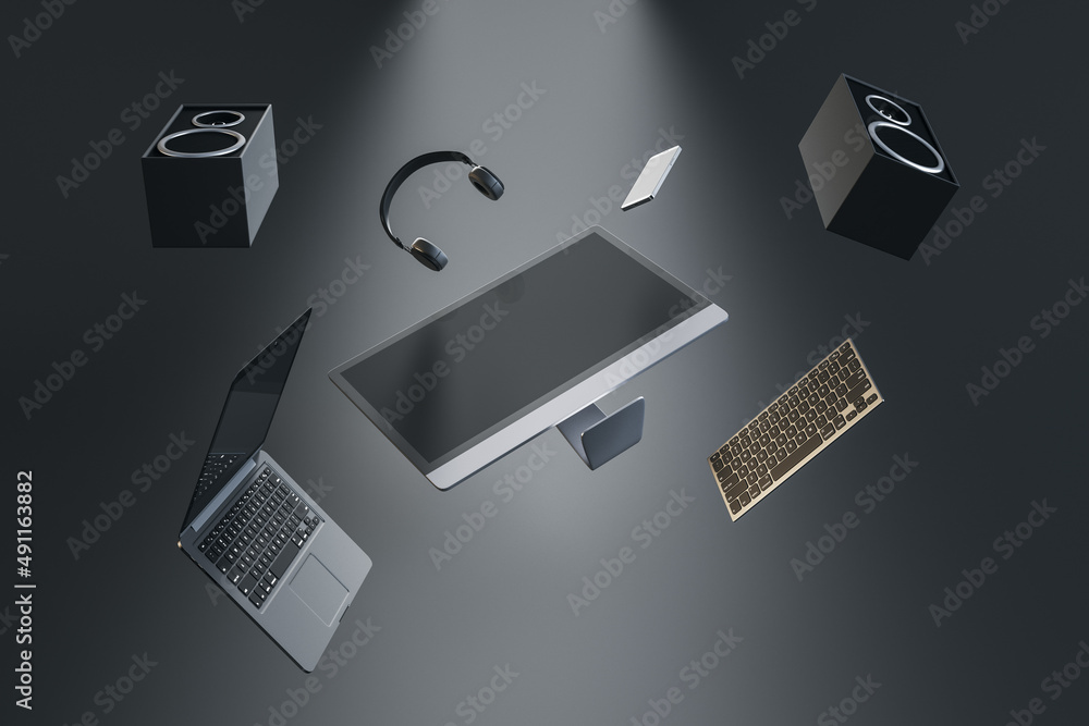 Poster abstract flying tech pieces on gray background. laptop computer, speakers and headphones. music and 