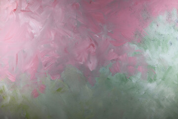 Fondo con texture materica dipinta in verde e rosa; spazio per testo